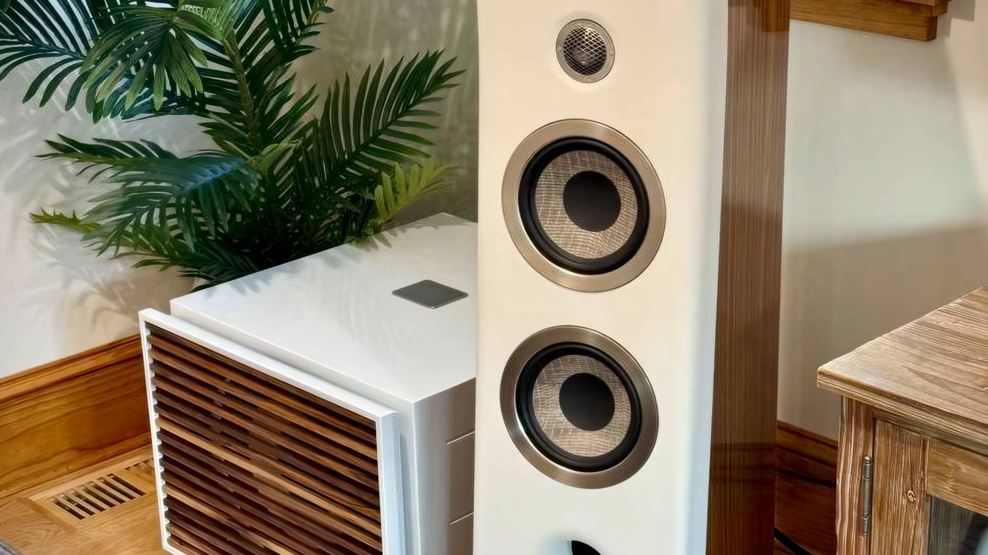 Focal Kanta 2 speaker next to a REL subwoofer in a listening room